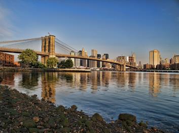 A unique photo of the Brooklyn Bridge and the river